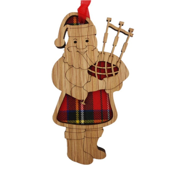 Scottish Santa Hanging Plaque on an oak veneered surround and a Royal Stewart tartan background.