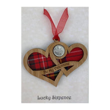 Load image into Gallery viewer, Wooden Plaque shaped with two hearts joined with lucky sixpence and tartan background, engraved with Be My Valentine
